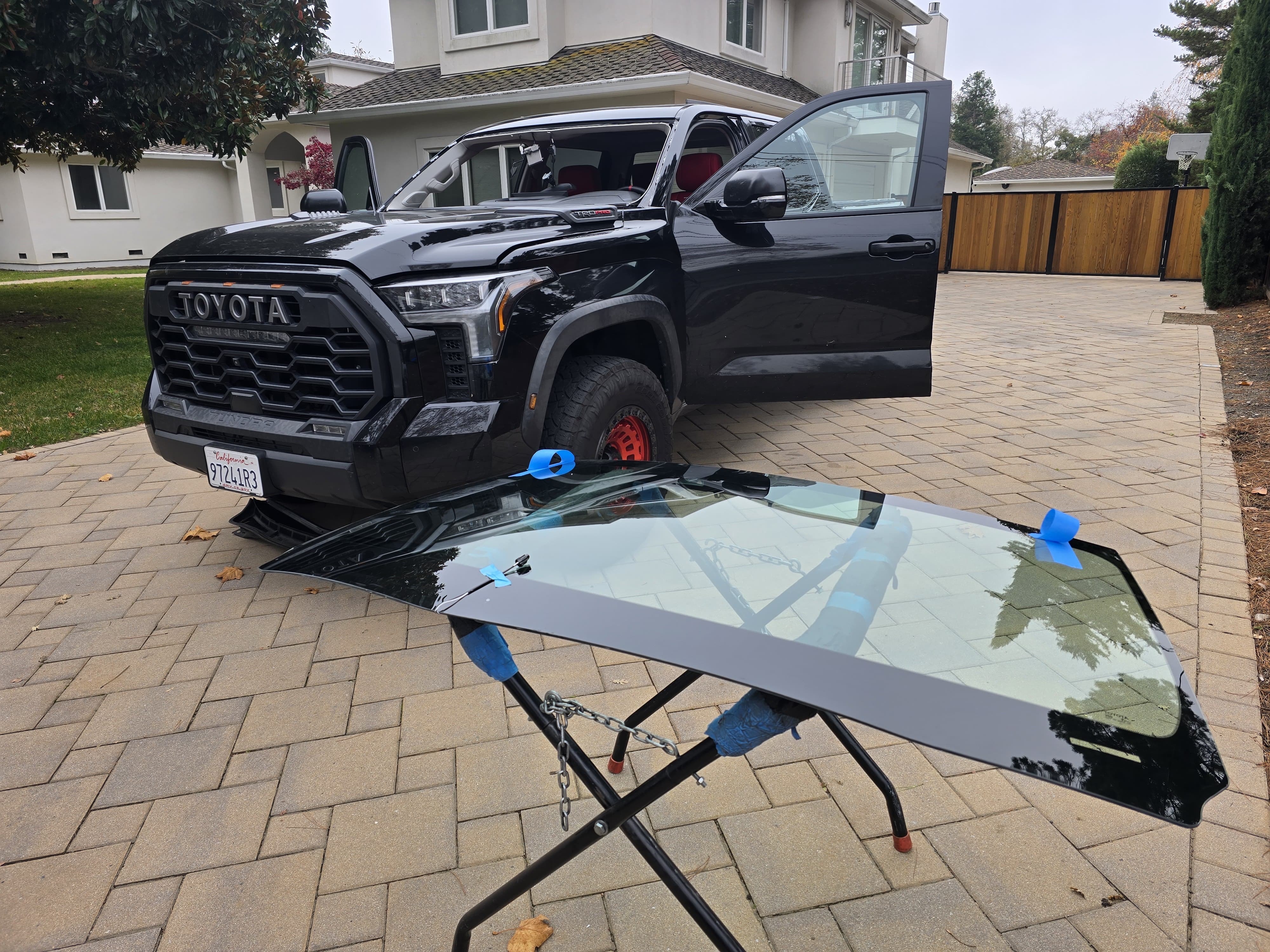 Black Toyota Tundra TRD Pro with windshield removed during mobile windshield replacement service by Gateway Auto Glass