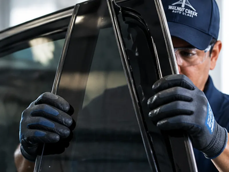 Gateway Auto Glass technician installing door glass